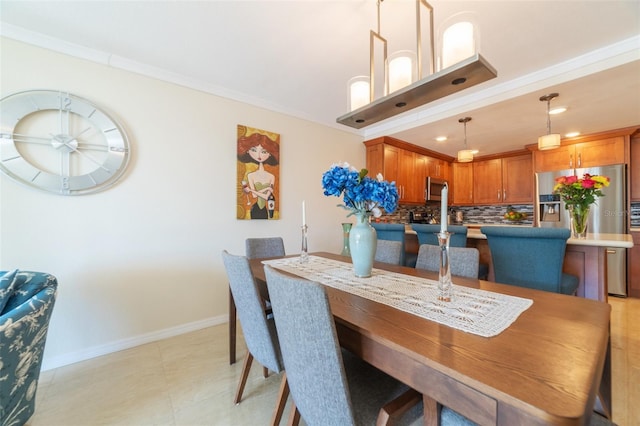 tiled dining area with ornamental molding