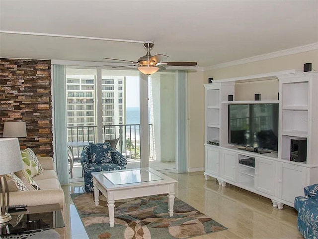 living room with ornamental molding and ceiling fan