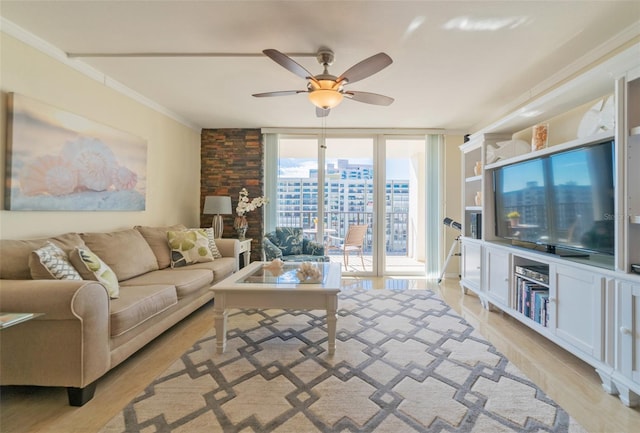 living room with light hardwood / wood-style flooring, ornamental molding, expansive windows, and ceiling fan