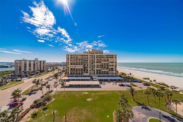 drone / aerial view with a view of the beach and a water view