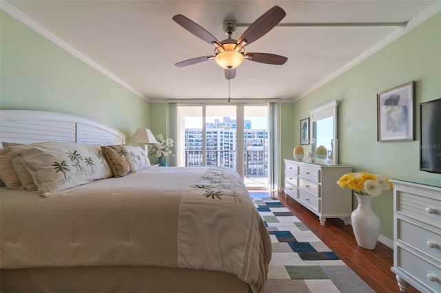 bedroom with a wall of windows, ornamental molding, dark hardwood / wood-style floors, ceiling fan, and access to exterior