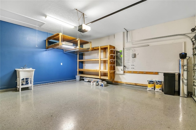 garage featuring a garage door opener and electric panel