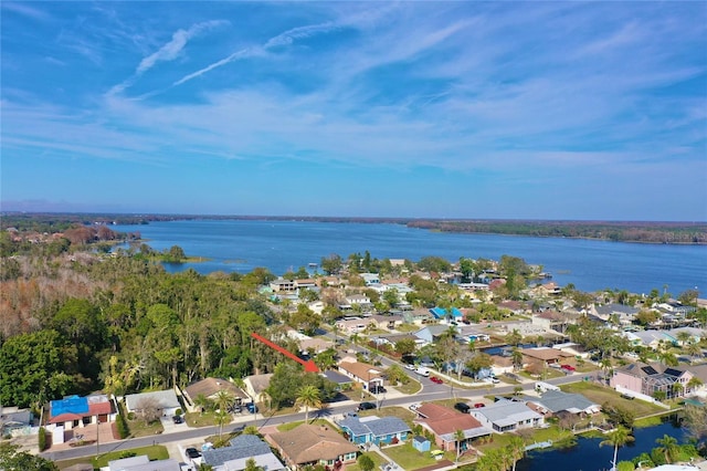 drone / aerial view with a water view