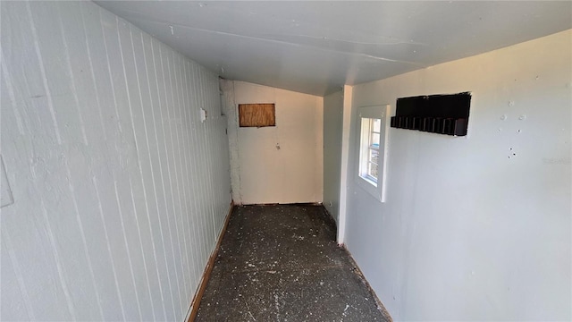 hallway featuring lofted ceiling