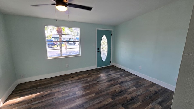 entryway with dark wood-type flooring and ceiling fan