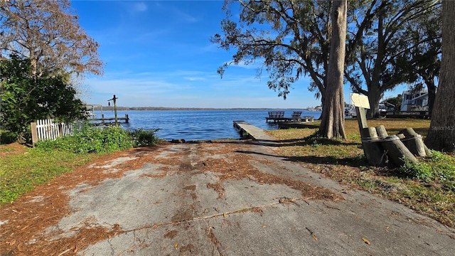 view of water feature with a dock