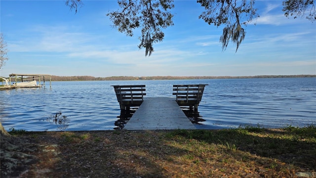 view of dock with a water view