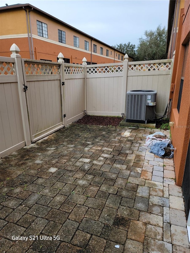 view of patio featuring cooling unit