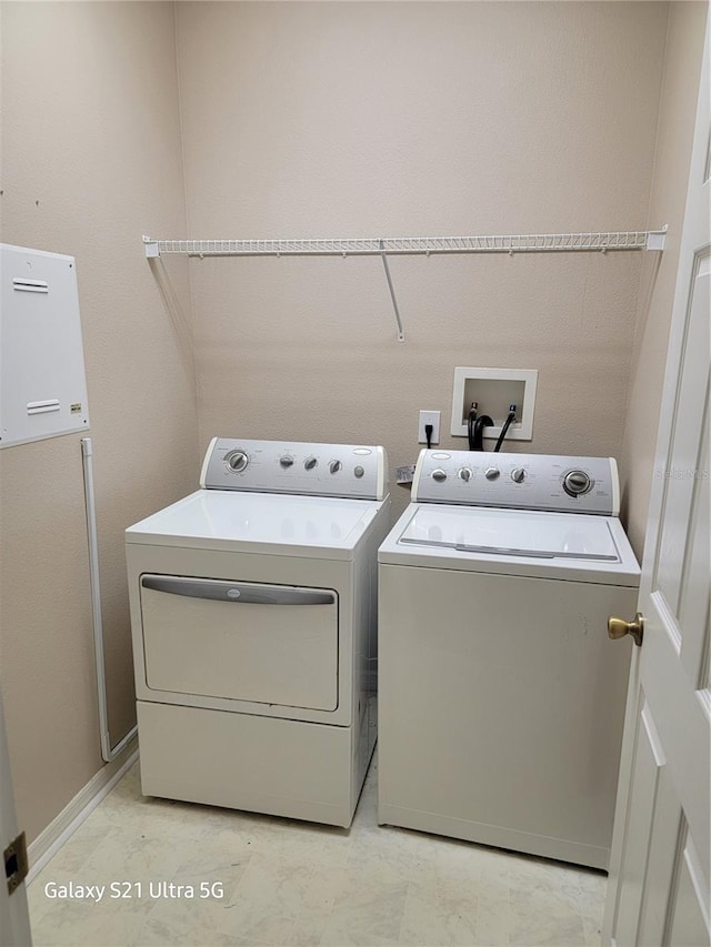 laundry area featuring separate washer and dryer