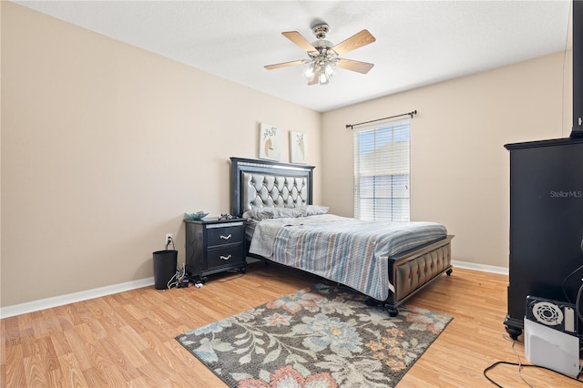 bedroom featuring ceiling fan and light wood-type flooring