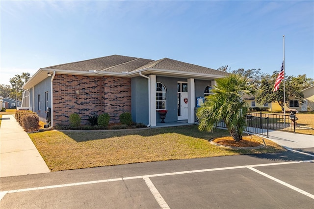 view of front of home with a front yard