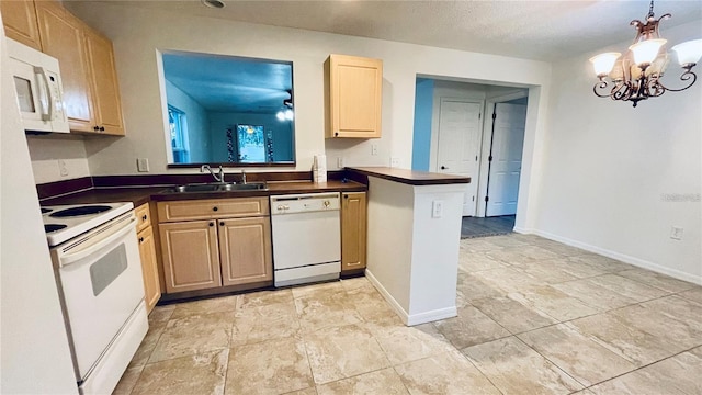 kitchen with sink, white appliances, decorative light fixtures, kitchen peninsula, and light brown cabinets