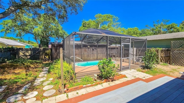 view of patio with a fenced in pool and a lanai