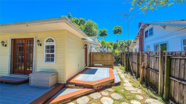 exterior space featuring french doors and a wooden deck