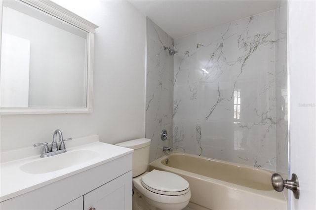 full bathroom with vanity, toilet, and tiled shower / bath