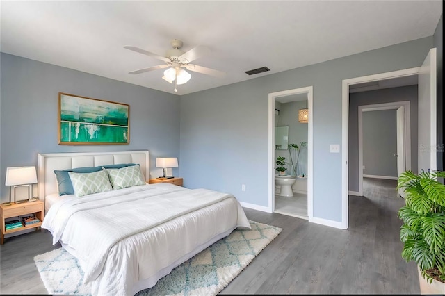 bedroom with ceiling fan, connected bathroom, and hardwood / wood-style floors