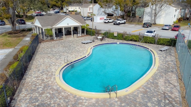 view of pool featuring a patio area