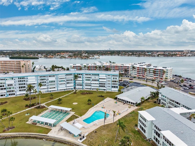 birds eye view of property with a water view