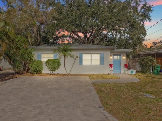 view of front of home featuring a yard