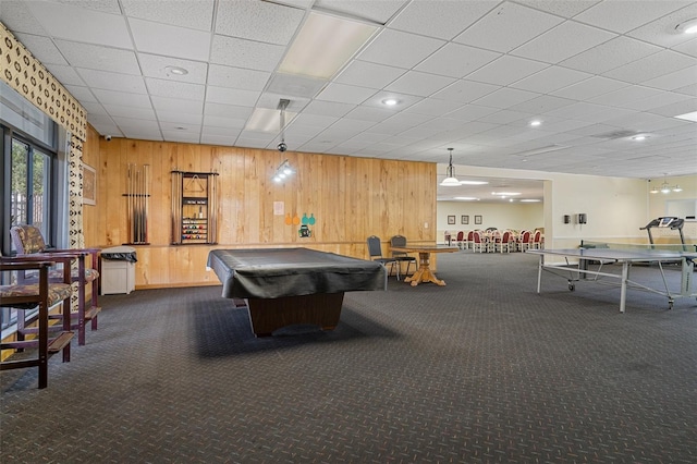 playroom with dark carpet, billiards, and wood walls