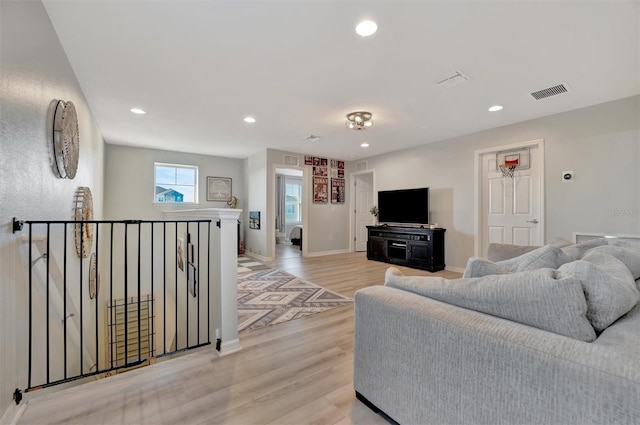 living room featuring light wood-type flooring