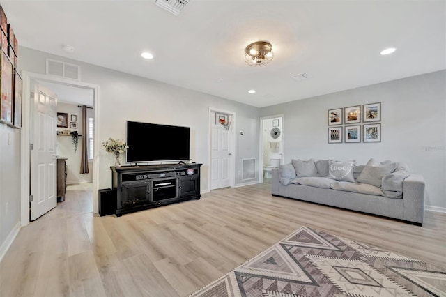 living room featuring light hardwood / wood-style flooring