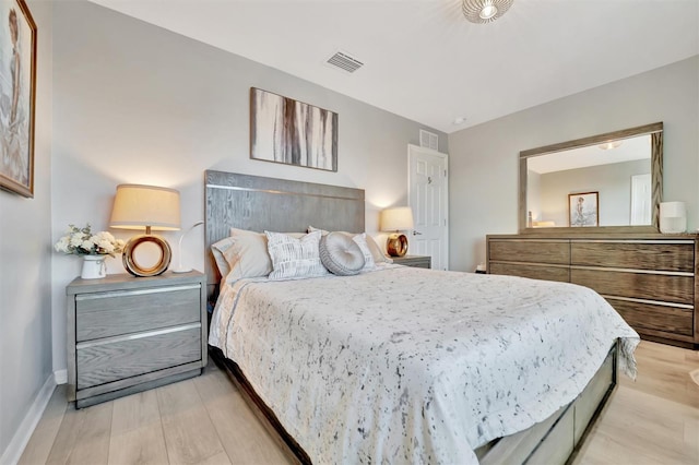 bedroom with light wood-type flooring