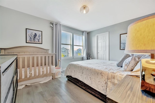 bedroom featuring light hardwood / wood-style floors