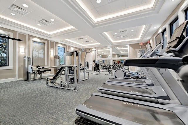 workout area with ornamental molding, carpet, and coffered ceiling