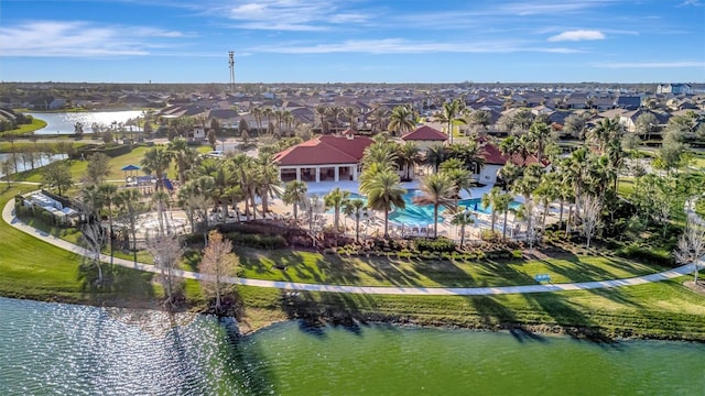 birds eye view of property with a water view