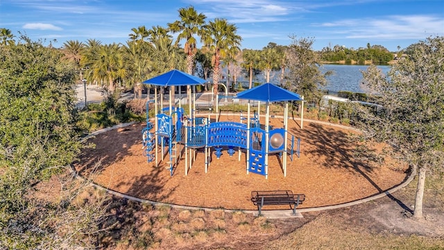 view of jungle gym with a water view