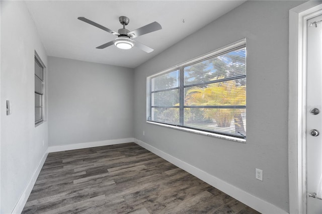 unfurnished room featuring dark hardwood / wood-style floors and ceiling fan