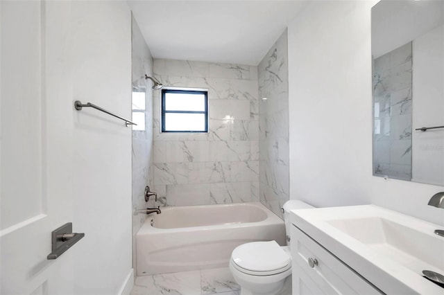 full bathroom featuring vanity, toilet, and tiled shower / bath