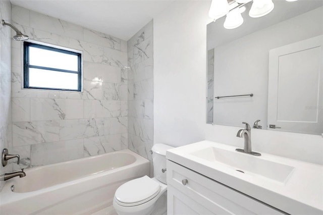 full bathroom featuring vanity, toilet, and tiled shower / bath