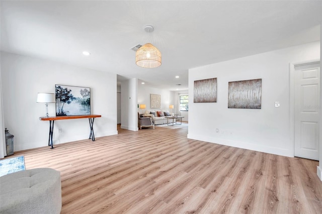 unfurnished living room featuring light hardwood / wood-style flooring