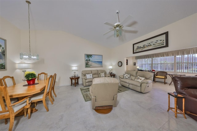 living area with a ceiling fan and high vaulted ceiling