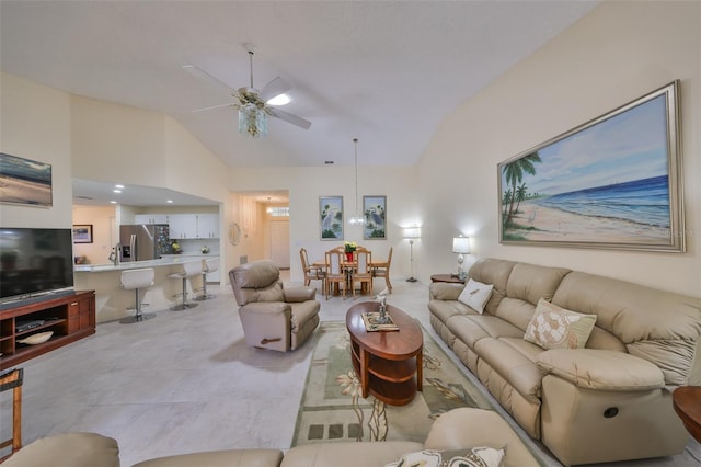 living room featuring ceiling fan and high vaulted ceiling