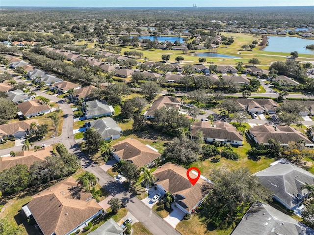 bird's eye view with a water view and a residential view