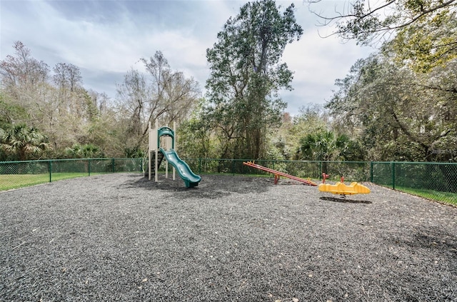 1433 Pine Glen Pl Unit G2, Tarpon Springs, FL 34688 - communal playground with fence