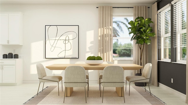 dining space featuring light wood-type flooring