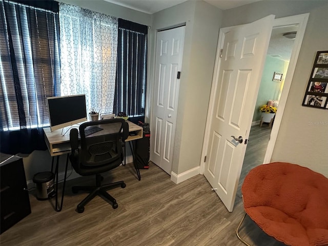 office space with wood-type flooring