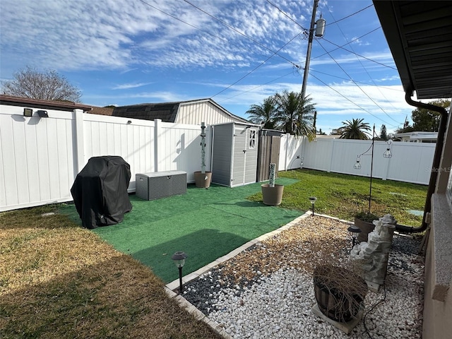 view of yard with a storage unit