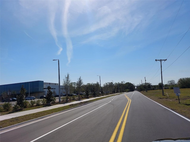 2616 Tarupa Ln, Ruskin, FL 33570 - view of road with sidewalks and street lights