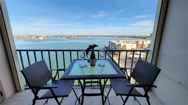 balcony featuring a water view