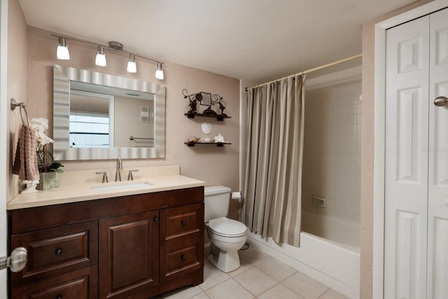 full bathroom with shower / bathtub combination with curtain, vanity, tile patterned floors, and toilet