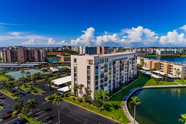 birds eye view of property featuring a water view