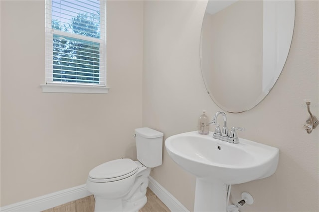 bathroom with sink and toilet