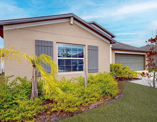 view of home's exterior with a garage