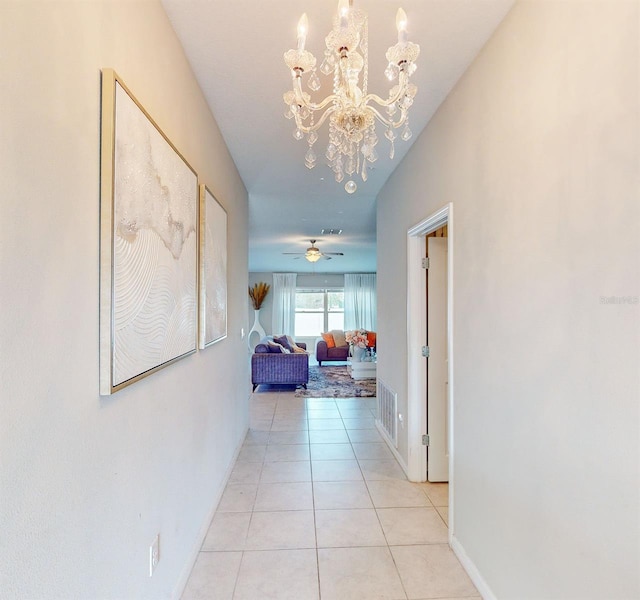 corridor featuring light tile patterned flooring