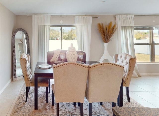 dining room with light tile patterned flooring